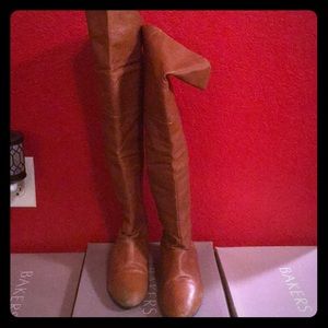 Tan knee boots.
